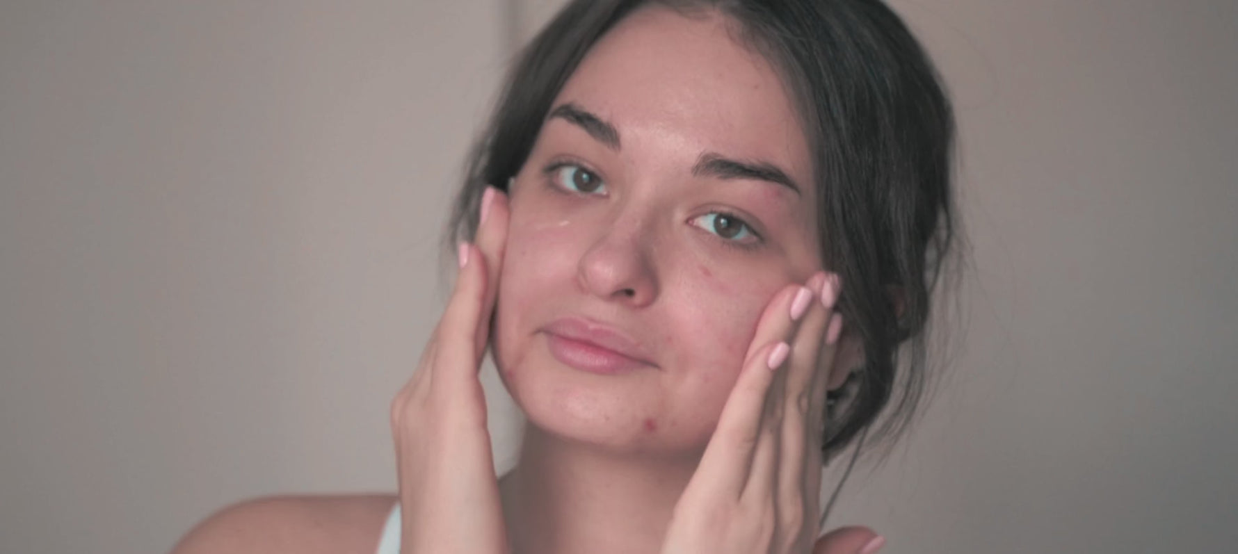 Ziva Beauty Rose Peptide Moisturiser absorbing into melanin-rich skin — natural anti-ageing skincare for pigmented skin